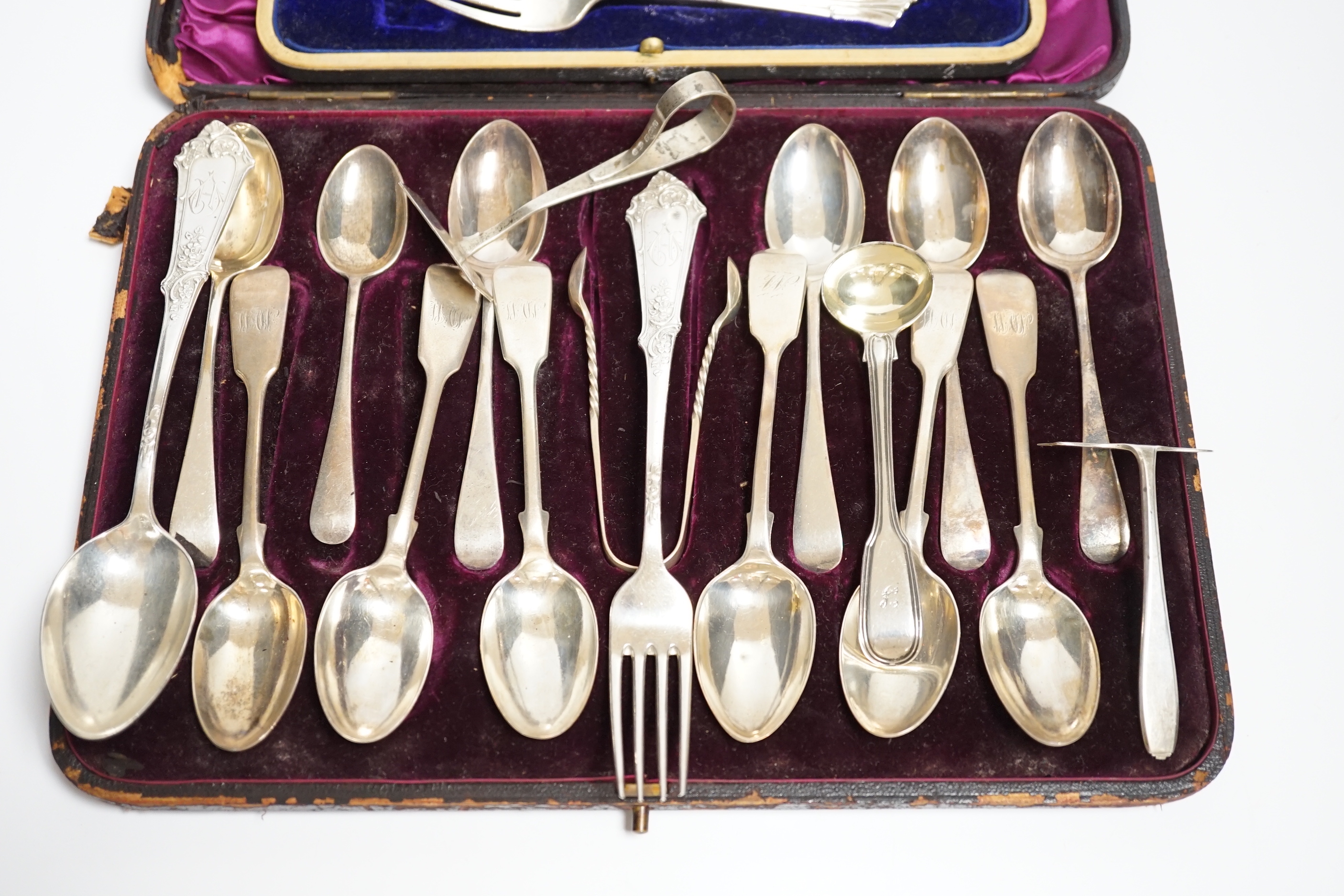 Two sets of six silver teaspoons, fiddle and Old English pattern and other silver or 900 flatware including a cased Christening trio (a.f.).